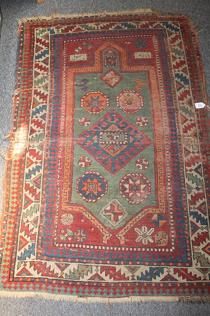 Appraisal: A COLLECTION OF RUGS to include a Caucasian rug dated