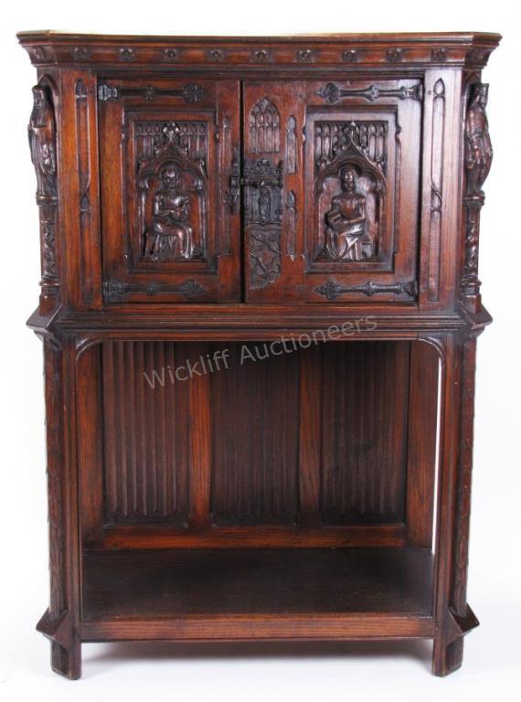 Appraisal: An early th century Flemish oak carved court cupboard made