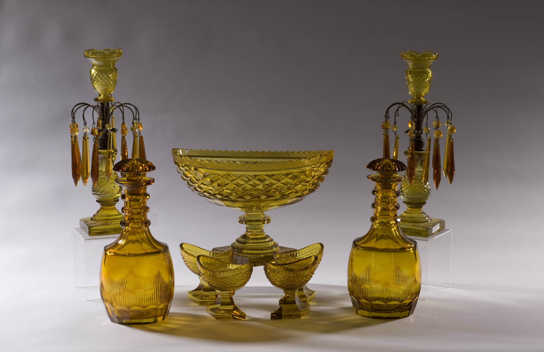 Appraisal: COLLECTION OF ENGLISH AMBER CUT GLASS INCLUDING A PAIR OF