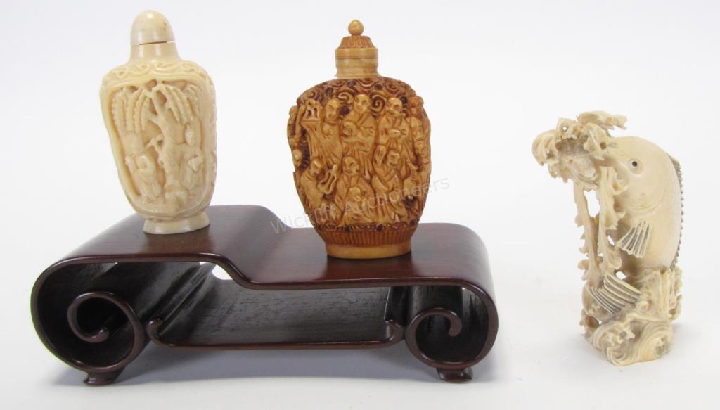 Appraisal: Three Oriental Carved Snuff Bottles one depicting figures with offerings