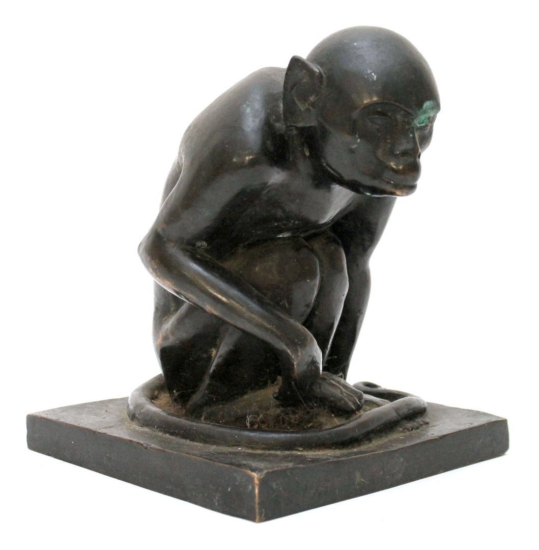 Appraisal: A patinated bronze figure of a monkey early th century