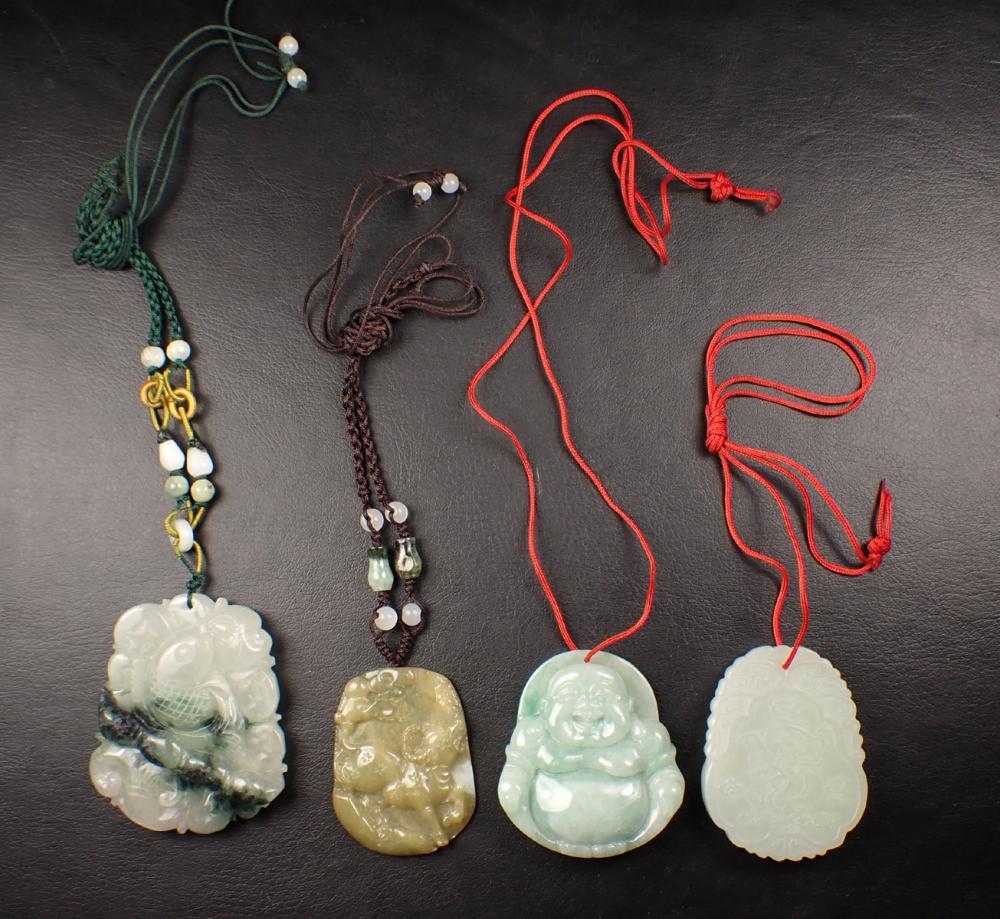 Appraisal: FOUR CHINESE CARVED JADE PENDANT NECKLACES of various size colors