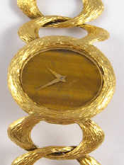 Appraisal: A lady's carat gold Bueche Girod wrist watch with integral