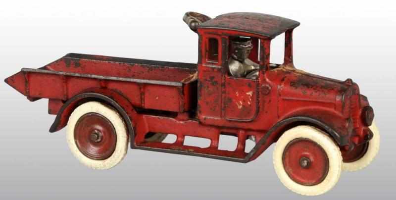 Appraisal: Cast Iron Arcade Red Baby Truck Toy Description American International