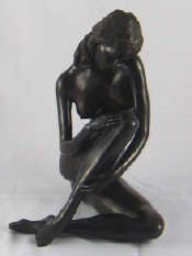 Appraisal: Tom Merrifield A bronze figure of a seated nude signed