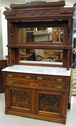 Appraisal: VICTORIAN WALNUT SIDEBOARD American c in two sections top section