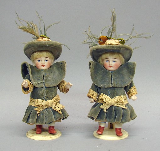 Appraisal: Pair of German dolls Molded features blonde mohair wigs Dolls