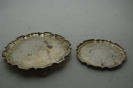 Appraisal: A small silver salver retailed by Harrods London of shaped