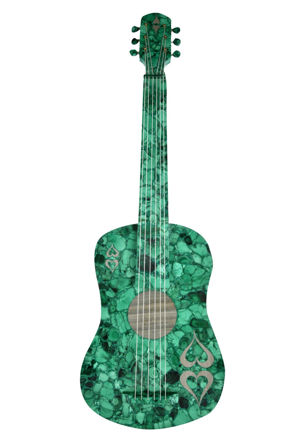 Appraisal: MALACHITE-VENEERED GUITARwith grey stone insets and thread strings Condition with