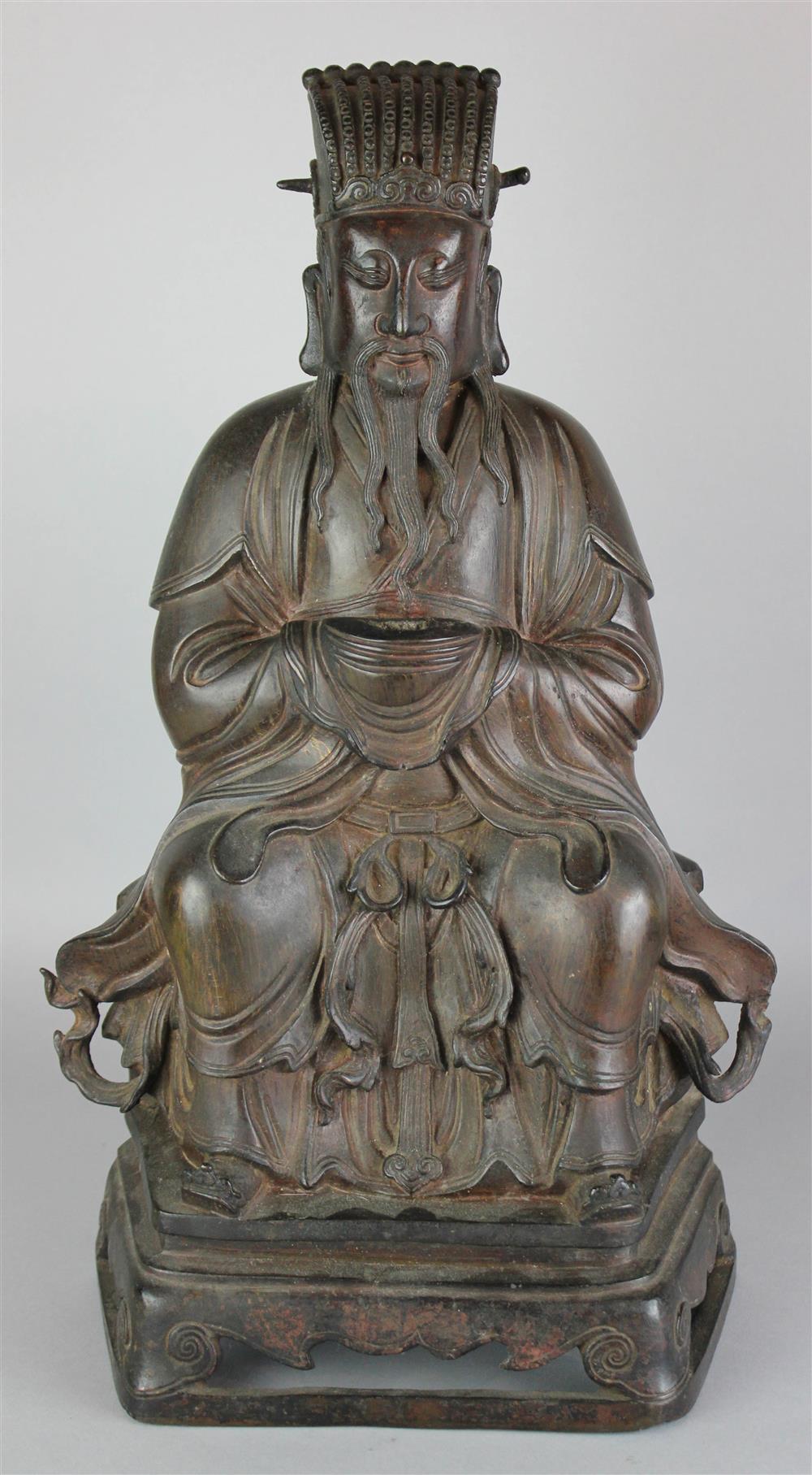 Appraisal: CHINESE BRONZE FIGURE OF A SEATED DIGNITARY QING DYNASTY the