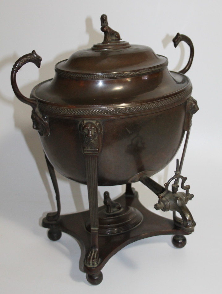 Appraisal: An early thC copper tea urn of Egyptian design and