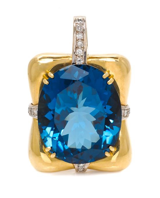 Appraisal: Sale Lot An Karat Bicolor Gold Blue Topaz and Diamond