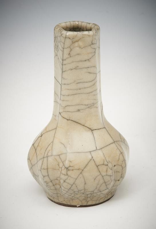 Appraisal: Chinese Lobed Bottle Vase Chinese Lobed Bottle Vase The compressed