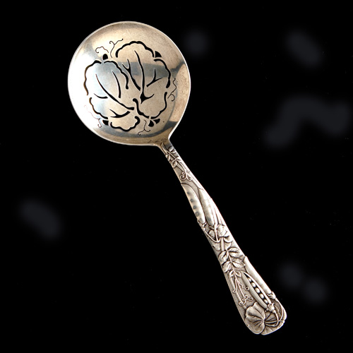 Appraisal: Tiffany Co Vine-Peapod pattern silver pea spoon ca Relief decoration