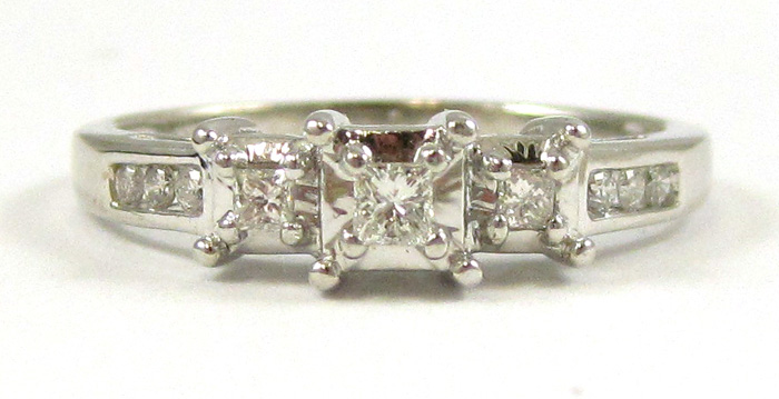 Appraisal: DIAMOND AND FOURTEEN KARAT WHITE GOLD RING set with three