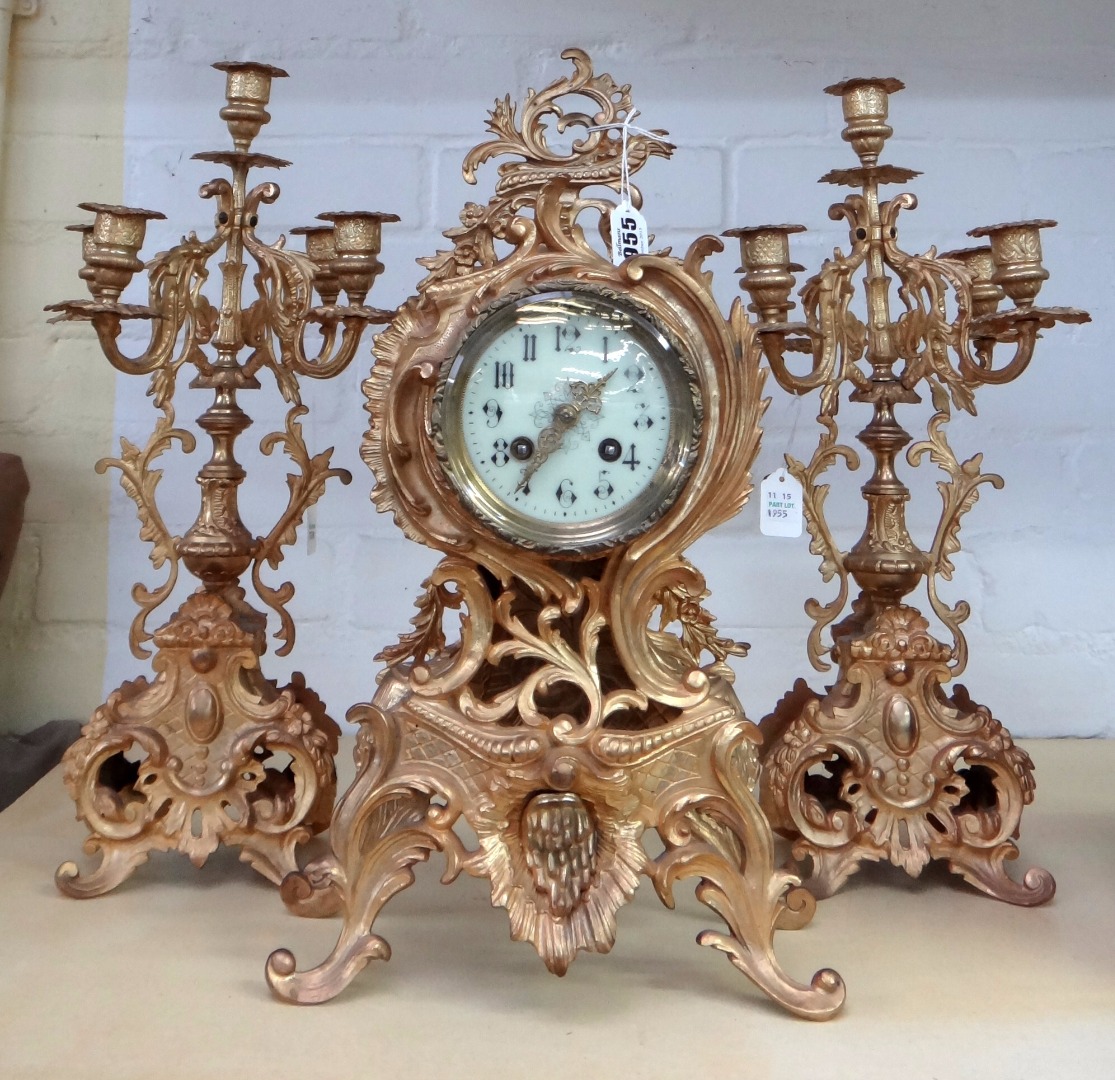 Appraisal: A French th century style gilt metal clock garniture th