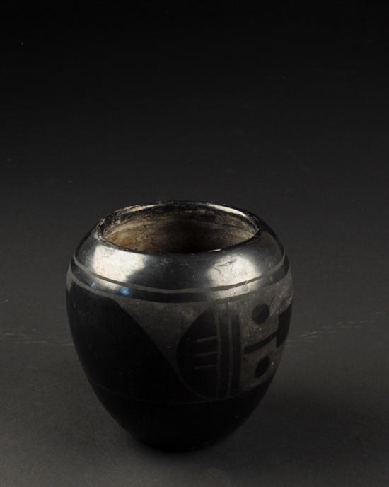 Appraisal: An Early San Ildefonso Black on Black Pottery Vase part