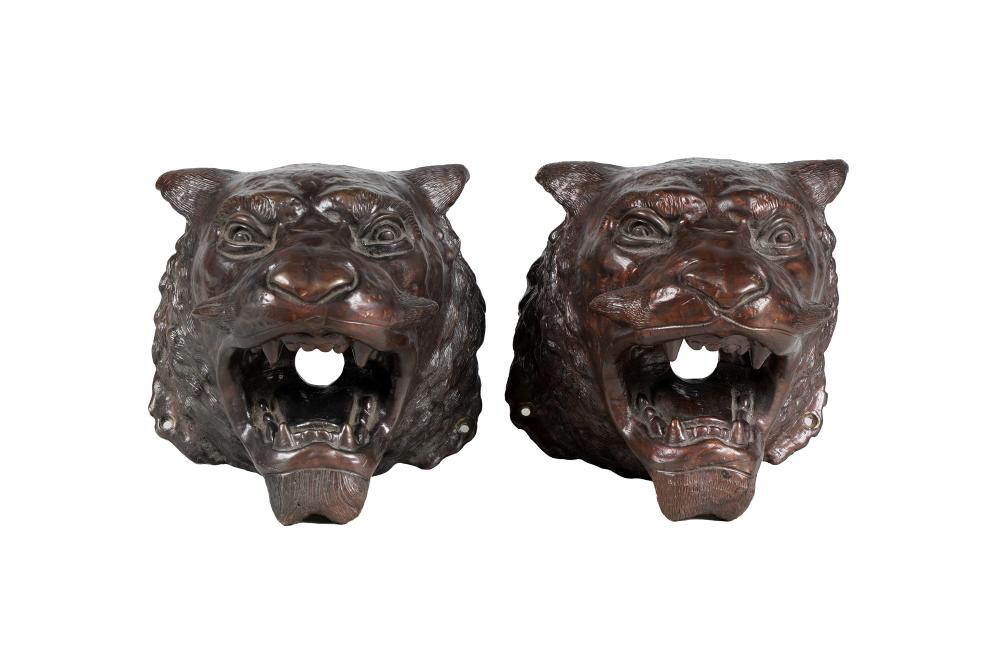 Appraisal: PAIR OF BRONZE LION HEADSpatinated bronze wall mounts each inches