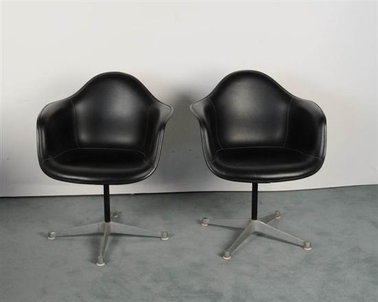 Appraisal: Two Eames Fiberglass and Faux Leather Chairs paper label Herman