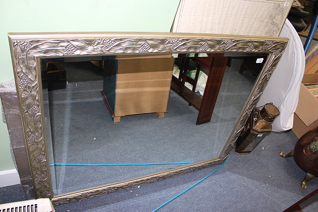 Appraisal: A MODERN RECTANGULAR HANGING WALL MIRROR with laurel decoration to