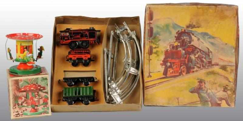 Appraisal: Lot of Tin Go-Around Train Set Toys Description German Both