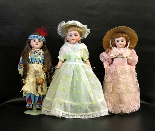 Appraisal: THREE GERMAN BISQUE HEAD GIRL DOLLS the first by Kestner