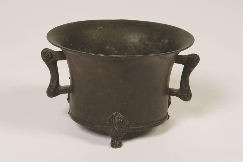 Appraisal: A CHINESE BRONZE TRIPOD CENSER of flared cylindrical form the