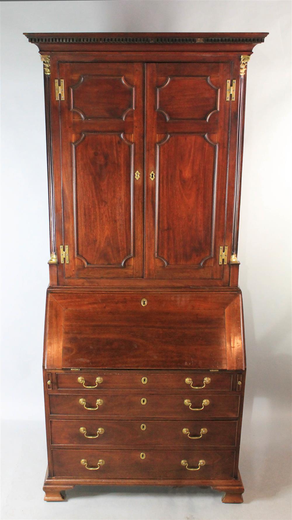 Appraisal: GEORGE III MAHOGANY SECRETARY BOOKCASE Molded cornice above panelled hinged