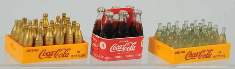 Appraisal: Lot of Miniature Coca-Cola Items Includes two s plastic cases