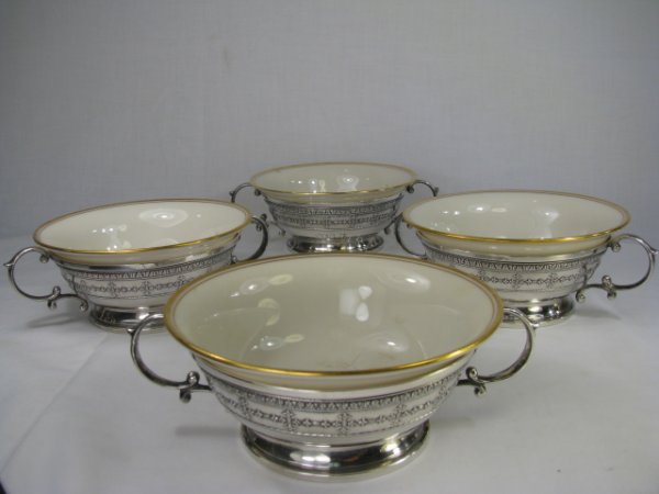 Appraisal: Four sterling silver mounted Lenox porcelain bouillon soup bowls Sterling