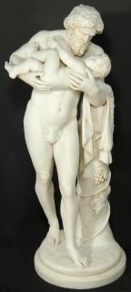 Appraisal: A RARE TH C MARBLE GROUP OF SILENUS AND DIONYSUS