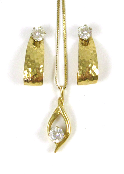 Appraisal: THREE ARTICLES OF CUBIC ZIRCONIA JEWELRY including a pendant necklace