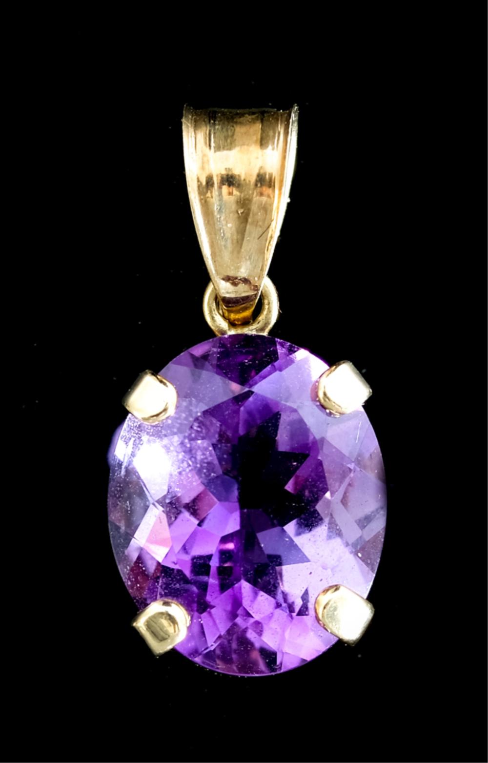 Appraisal: K YELLOW GOLD OVAL AMETHYST PENDANT k yellow gold pendant