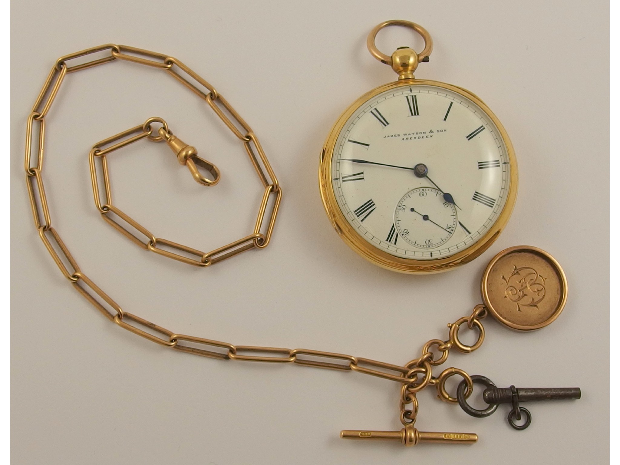 Appraisal: An ct open face pocket watch with ct fob chainthe