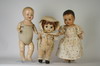 Appraisal: DOLLS - Lot of three unmarked composition children including a