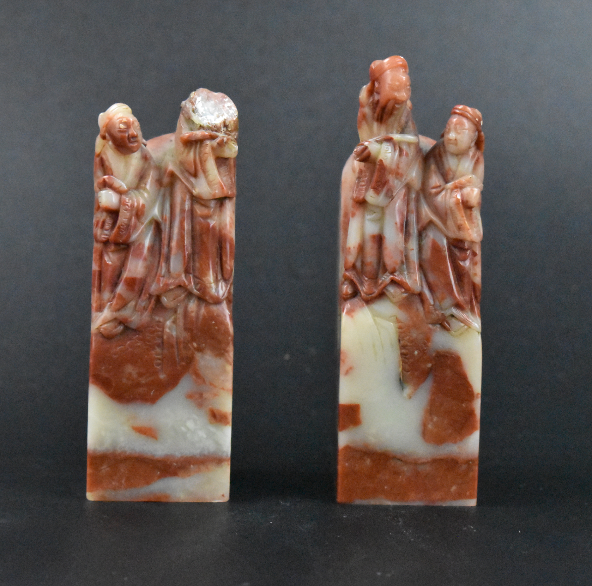 Appraisal: A pair of Chinese soapstone carved seals with carved figures