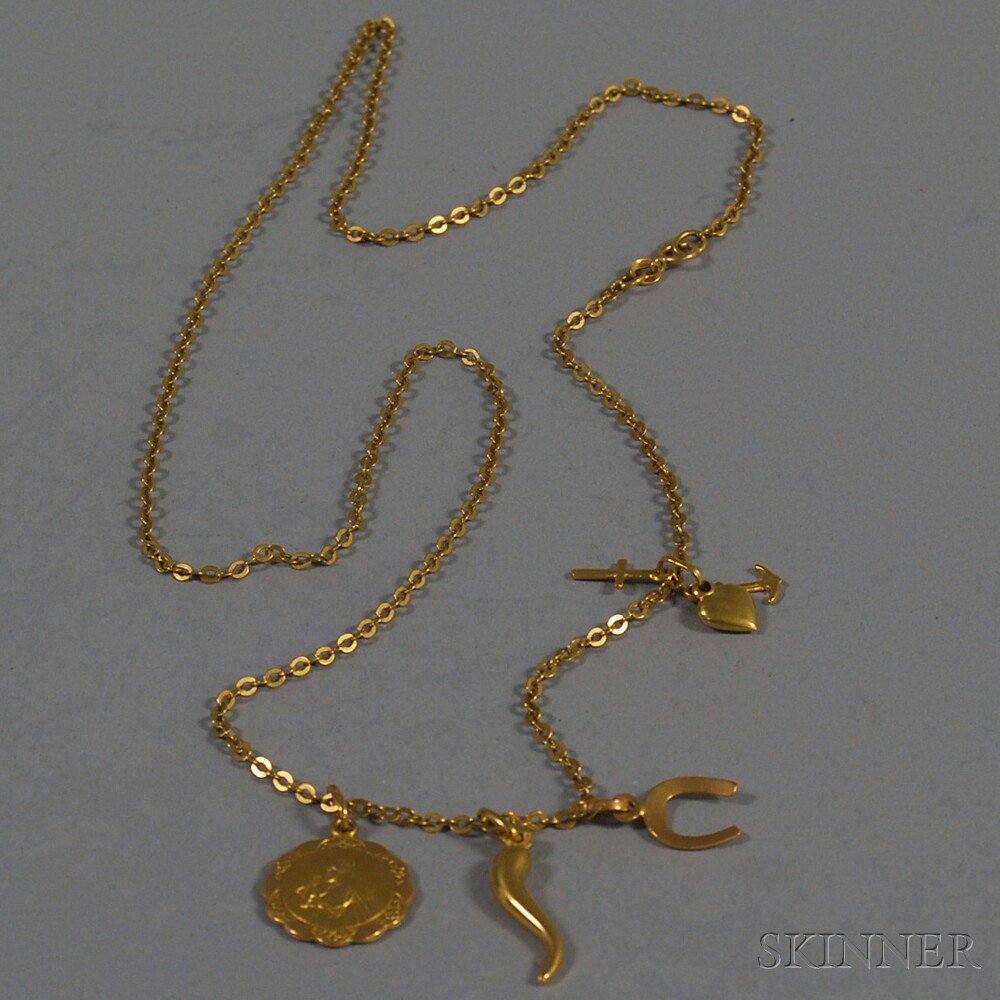 Appraisal: kt Gold Charm Necklace set with several small kt gold