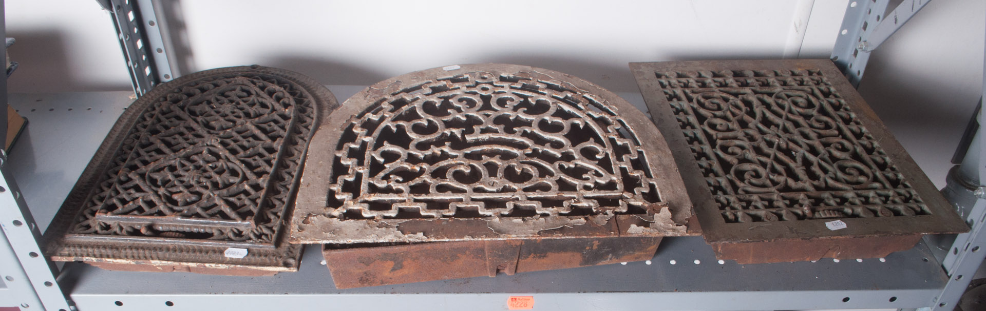 Appraisal: Three cast-iron heating grates