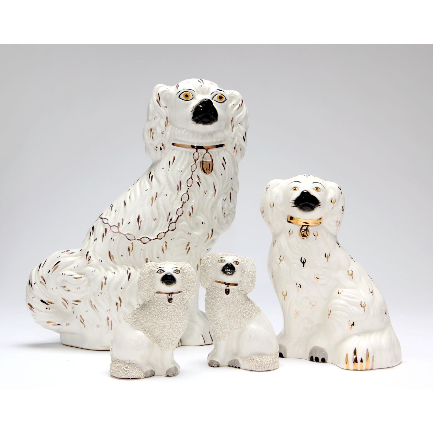 Appraisal: Four Staffordshire Porcelain Dogs circa the largest marked Old Staffordshire