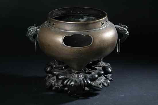 Appraisal: CHINESE BRONZE CENSER th century Dragon-form and loose ring handles