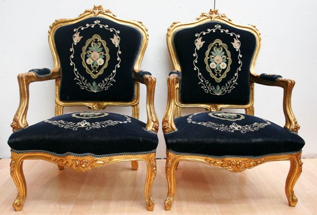 Appraisal: A pair of Louis XV style giltwood armchairs th century