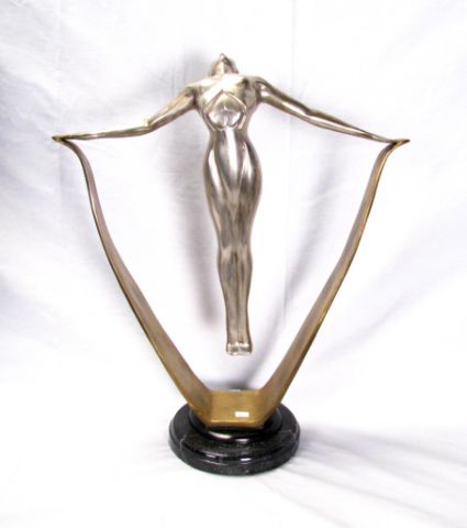 Appraisal: Cast metal and bronze art deco figural sculpture depicting female