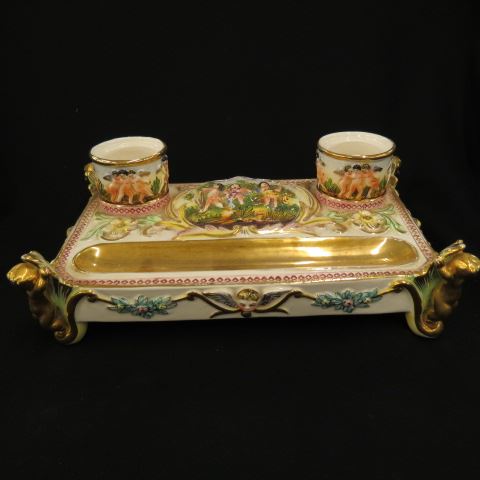 Appraisal: Capodimonte Pottery Inkstand footed cherub decor double well