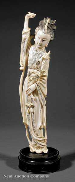 Appraisal: A Chinese Tinted Ivory Figure of Meiren the standing beauty