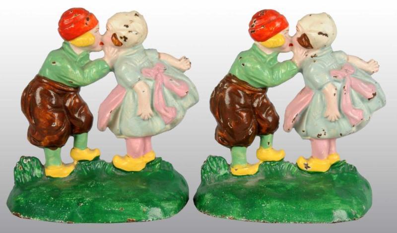 Appraisal: Cast Iron Dutch Boy and Girl Bookends Description Made by