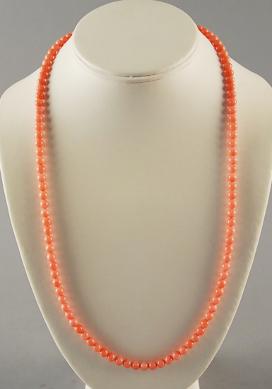 Appraisal: A Coral Bead Necklace with a gold filled clasp long