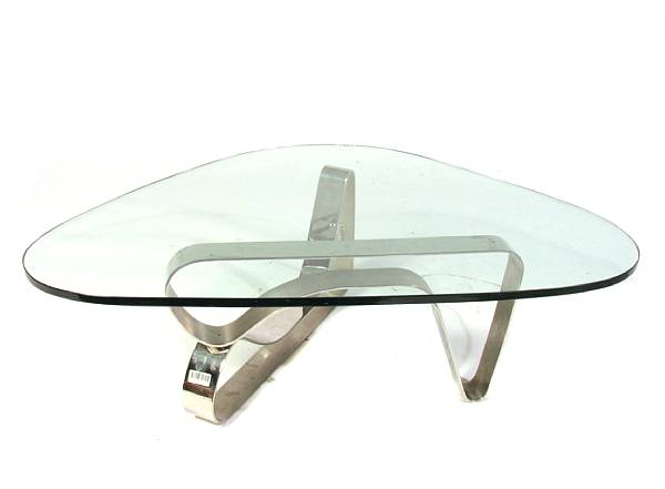 Appraisal: A contemporary chrome and glass free-form coffee table in the