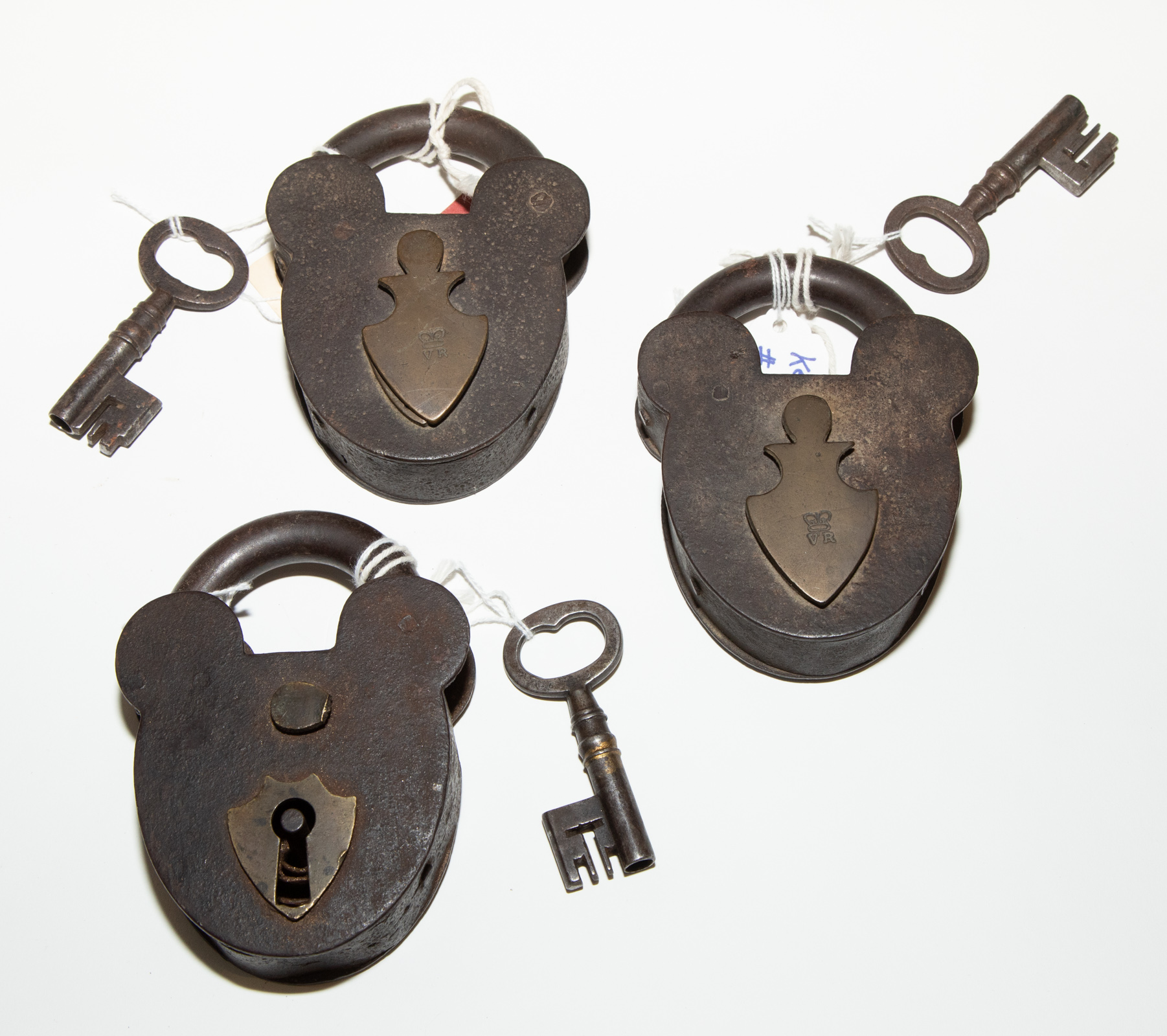 Appraisal: THREE ENGLISH IRON PADLOCKS WITH KEYS nd quarter th century