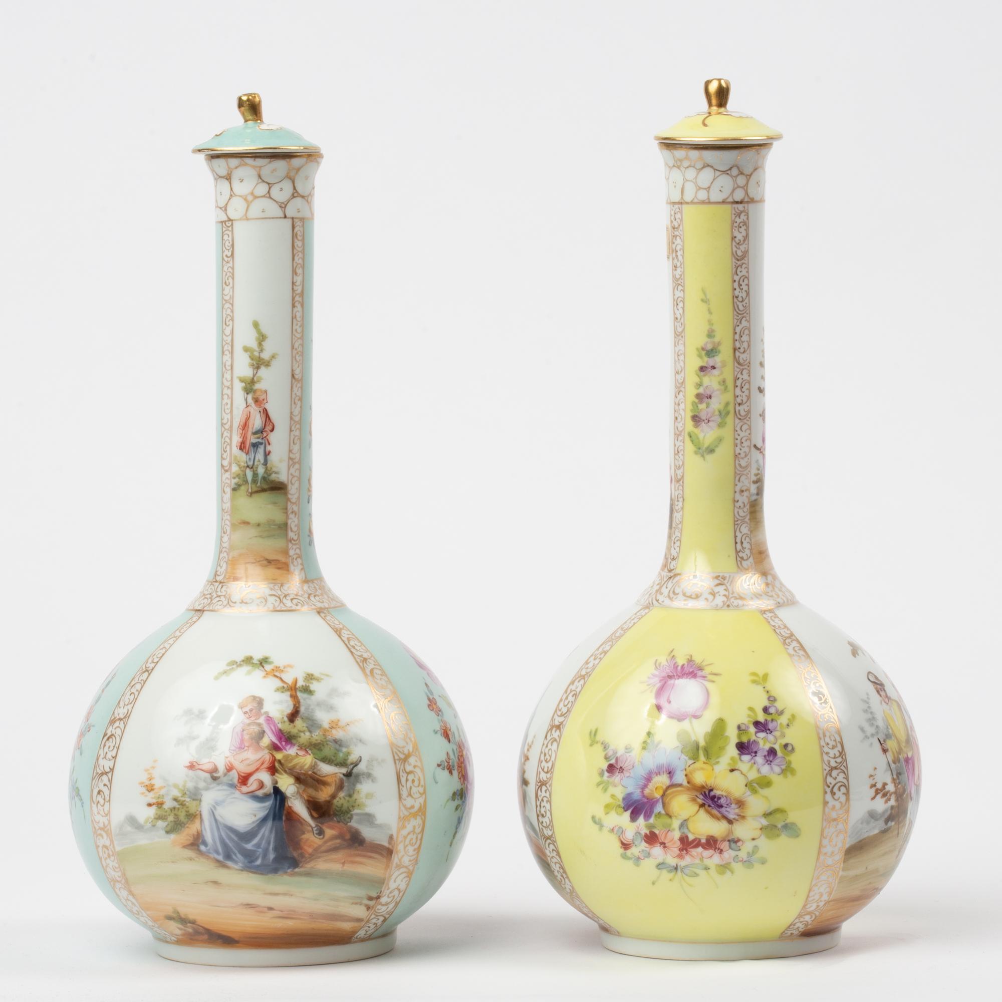 Appraisal: PAIR OF DRESDEN LIDDED BOTTLE VASES A pair of lidded