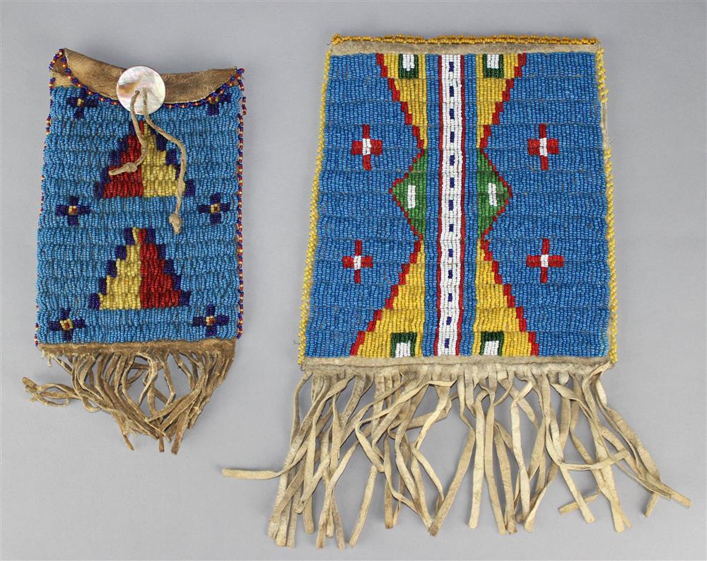 Appraisal: TWO PLAINS BEADED AND FRINGED HIDE BAGS bright blue grounds